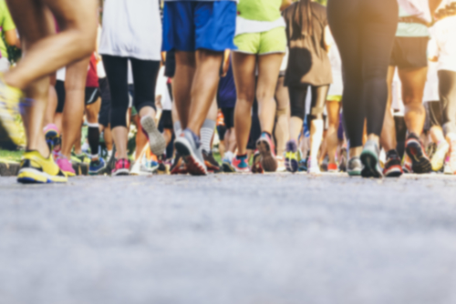 A group of runners legs