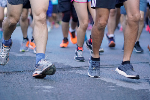 Group of runners legs