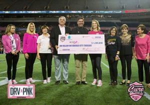 Group holding check at Cure Bowl