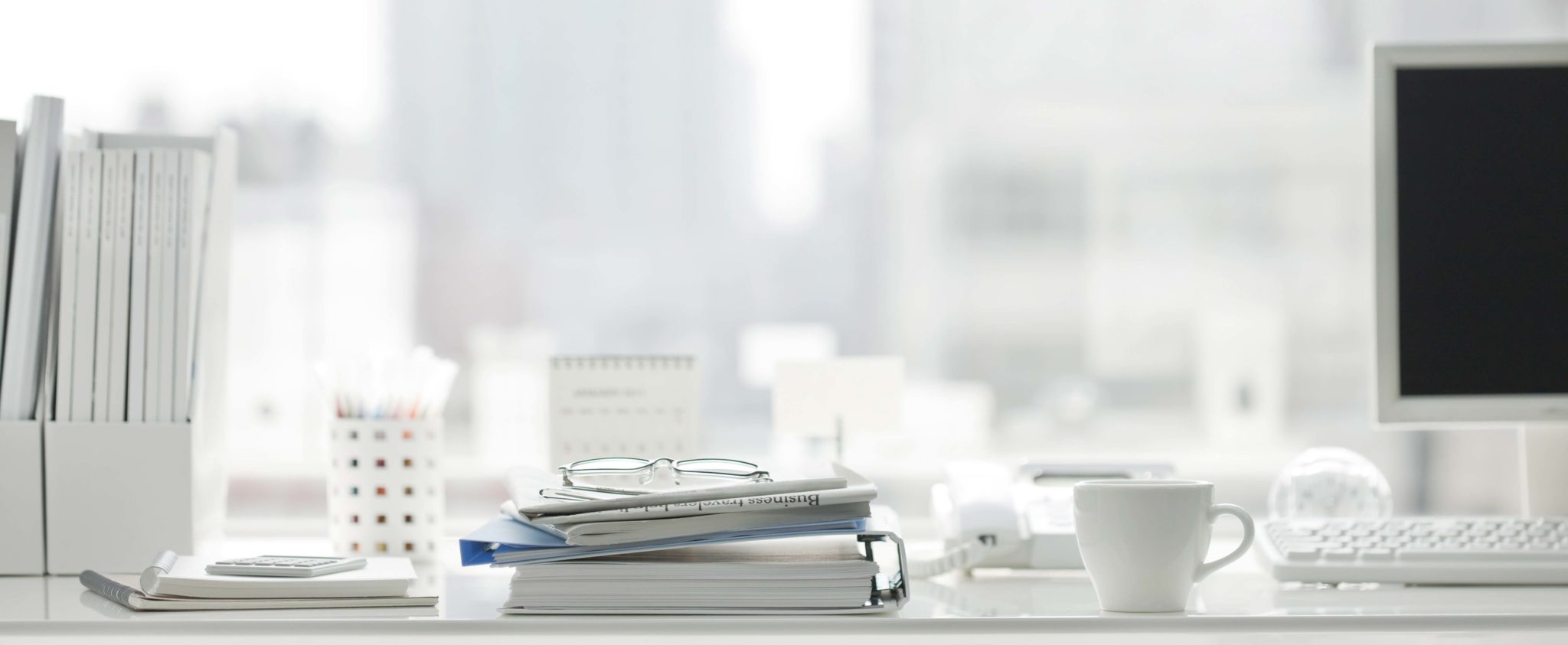 Papers and documents at a desk.